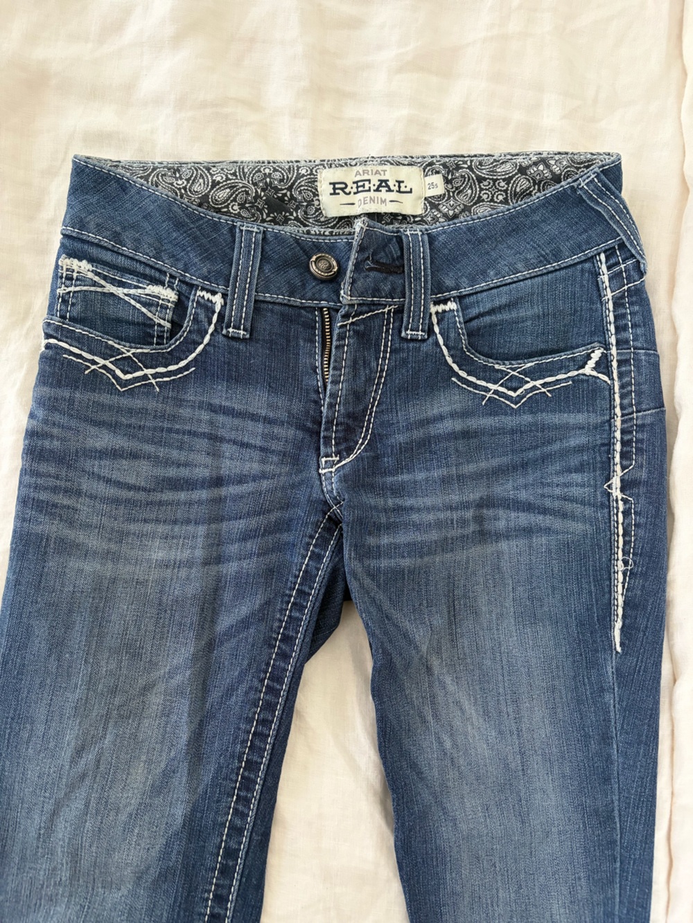 Ariat denim women 25S medium wash boot is western jeans